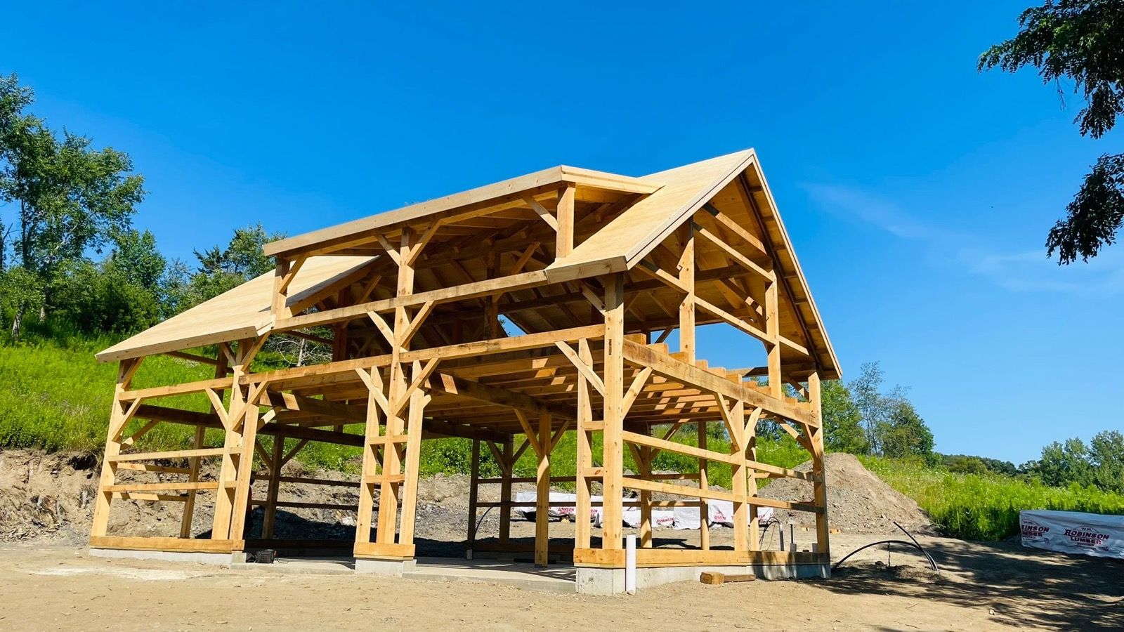 Timber-frame pavilion under construction by DA Home Improvement.